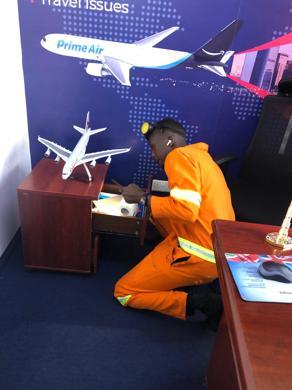 Kowa technician treating sofa for bed bugs